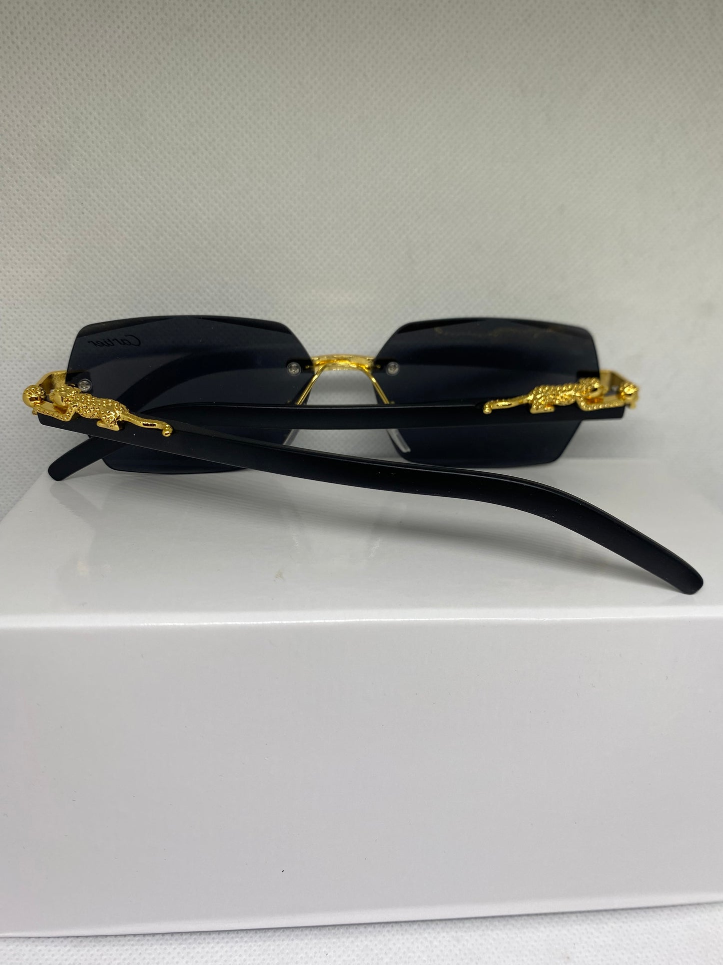 Cartier noir jaguar dore