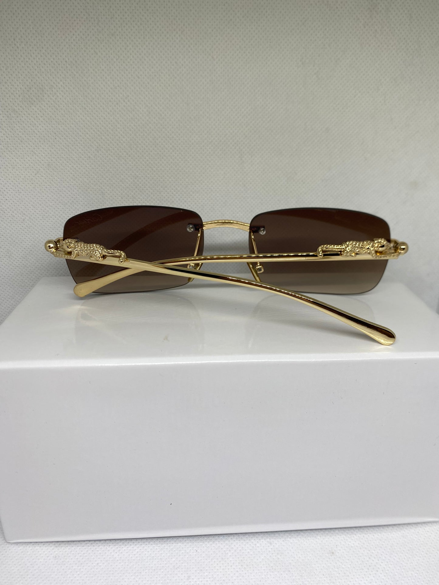 Cartier marron jaguar dore