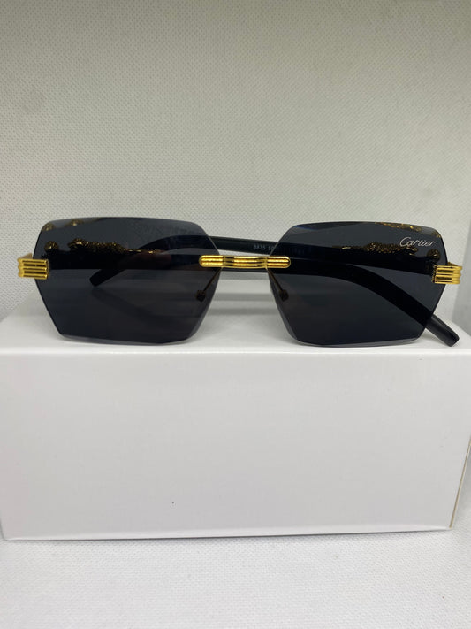 Cartier noir jaguar dore
