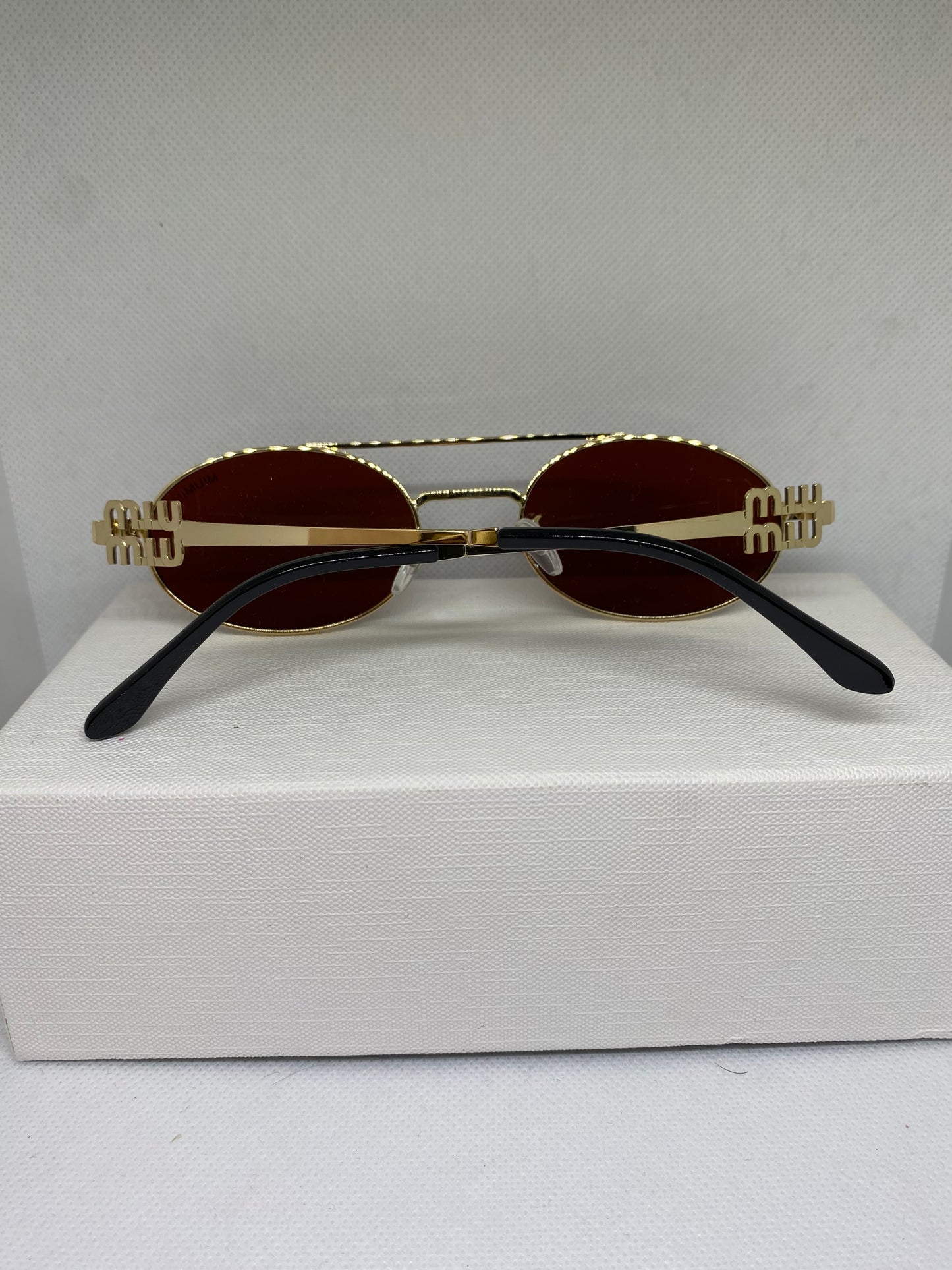 Miumiu dore rouge sang