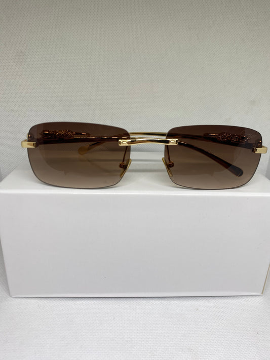 Cartier marron jaguar dore