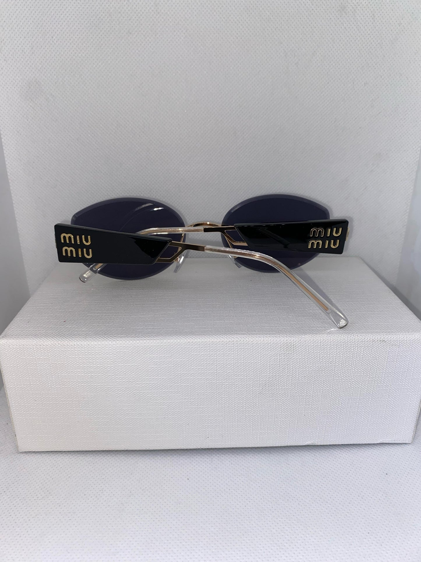 MIUMIU ROND BLACK DORÉ