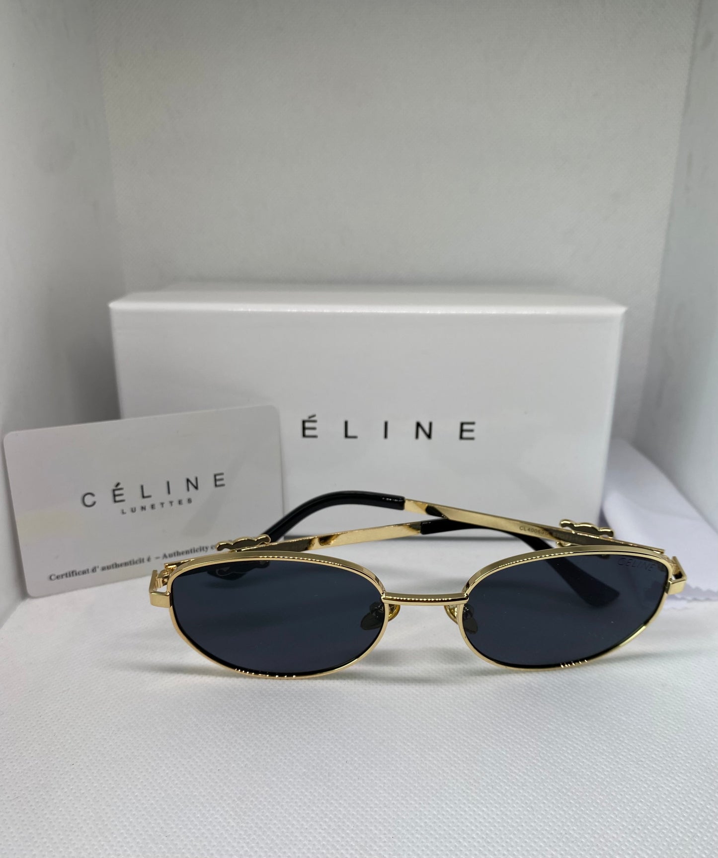 Céline noir dore fin