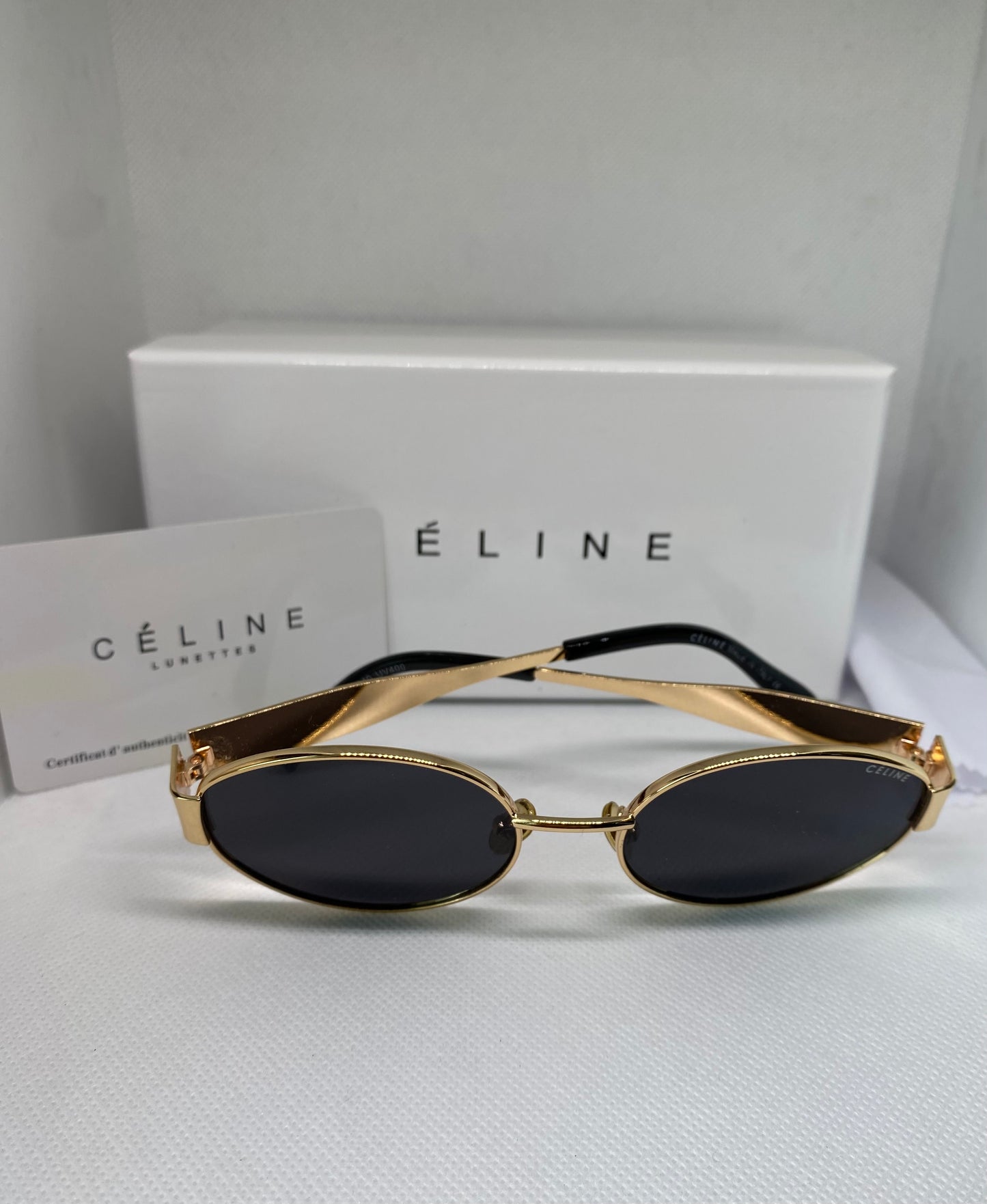 CELINE ROND NOIR DORÉ