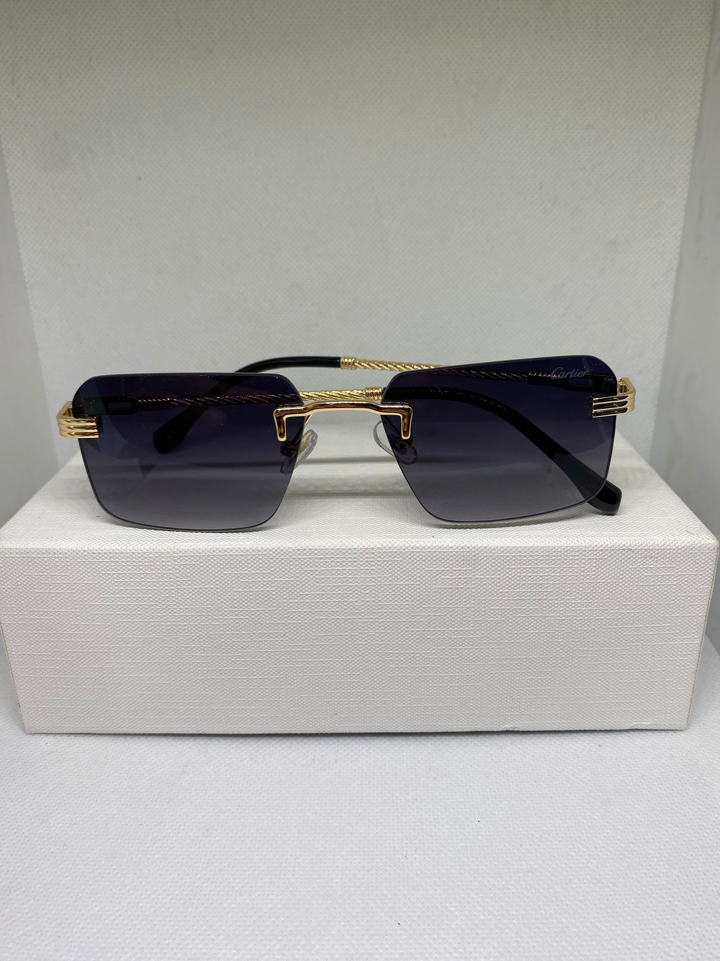 Cartier noir brique dore broche