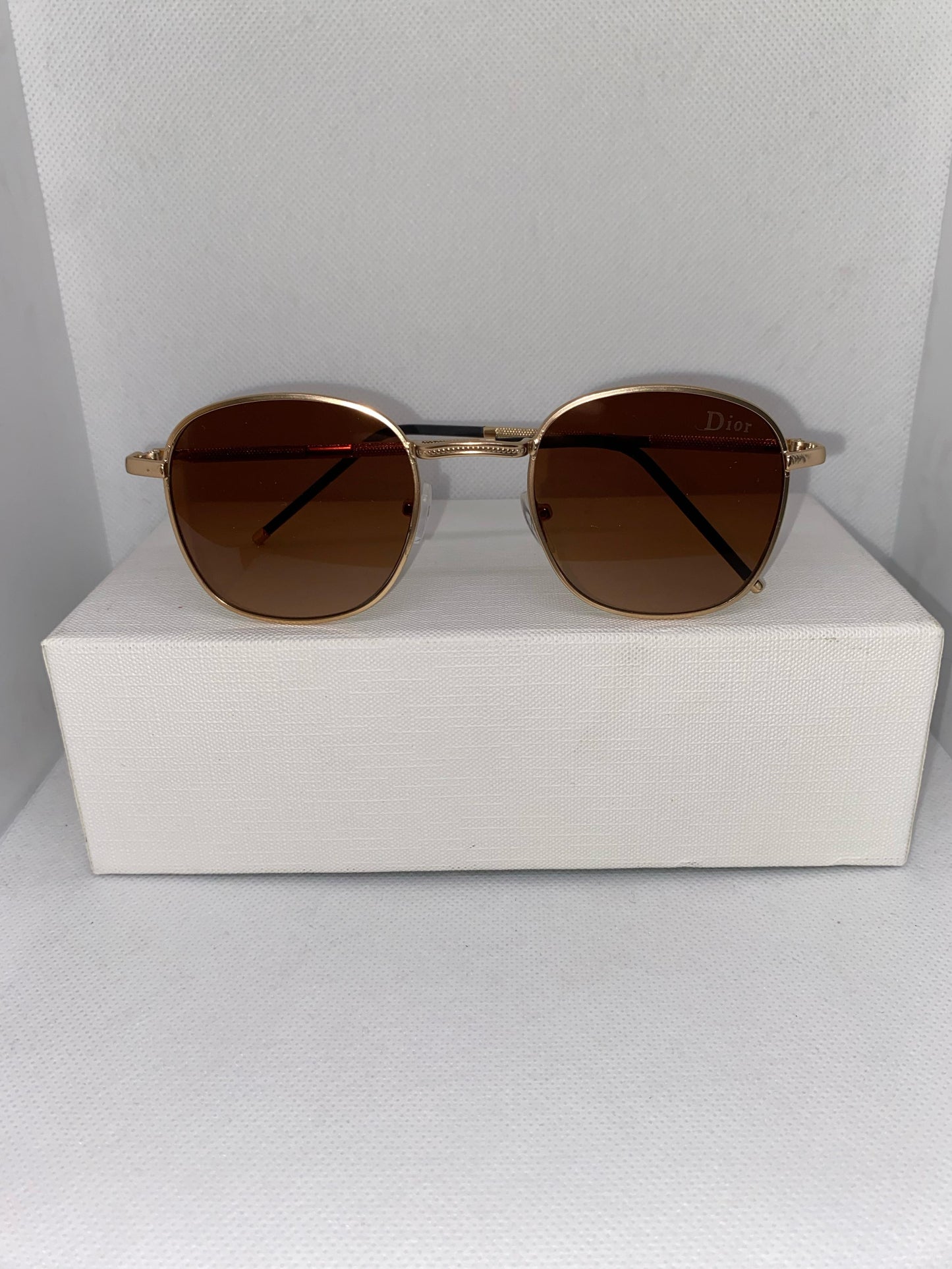 DIOR MARRON DORÉ