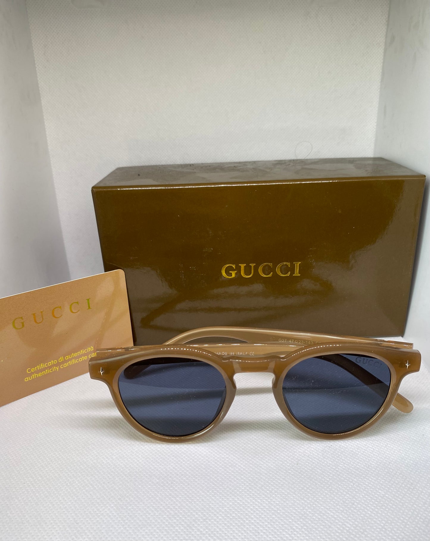 GUCCI marrron verre bleu