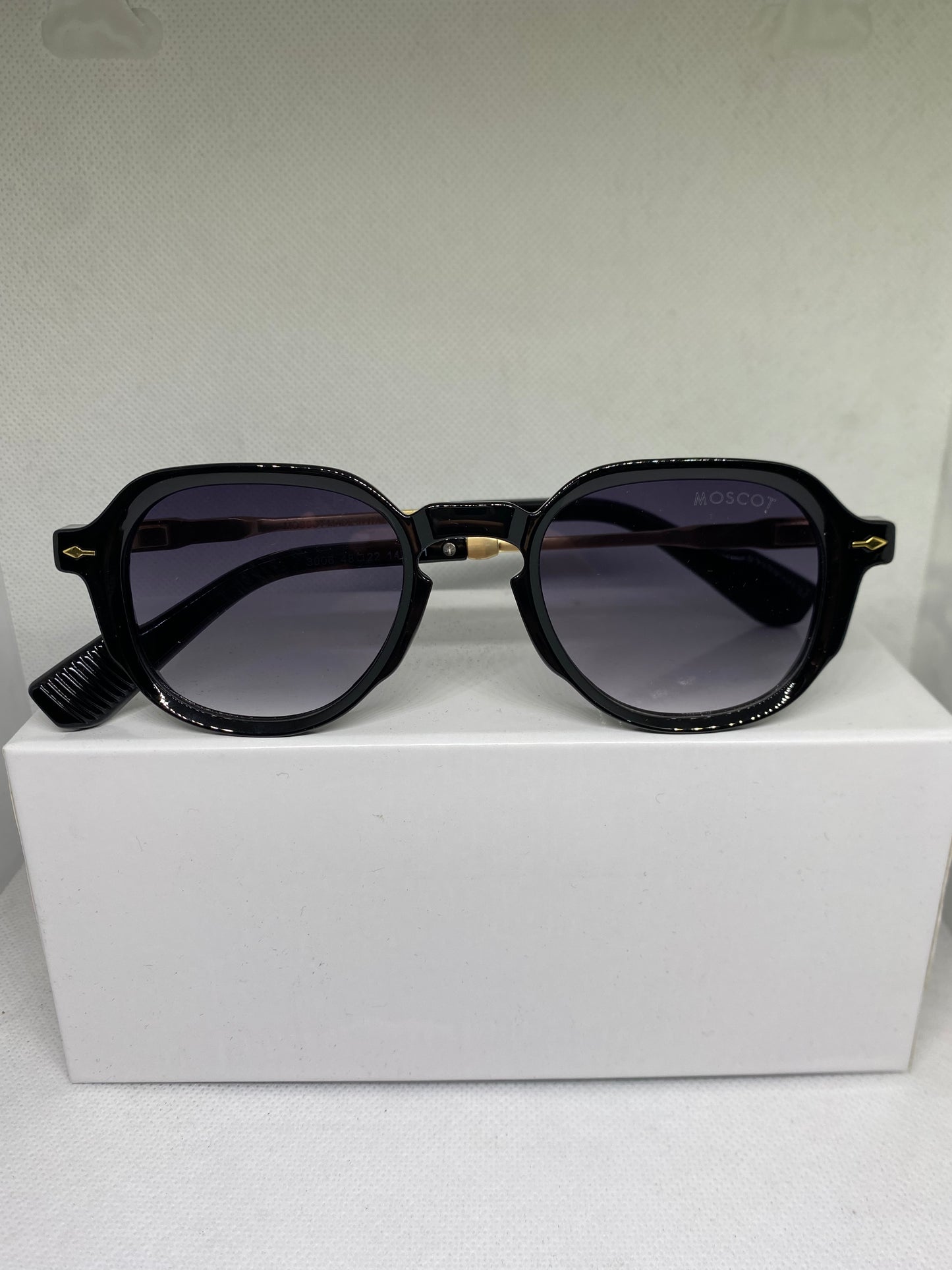 Moscot noir degrade dore fin 48-22